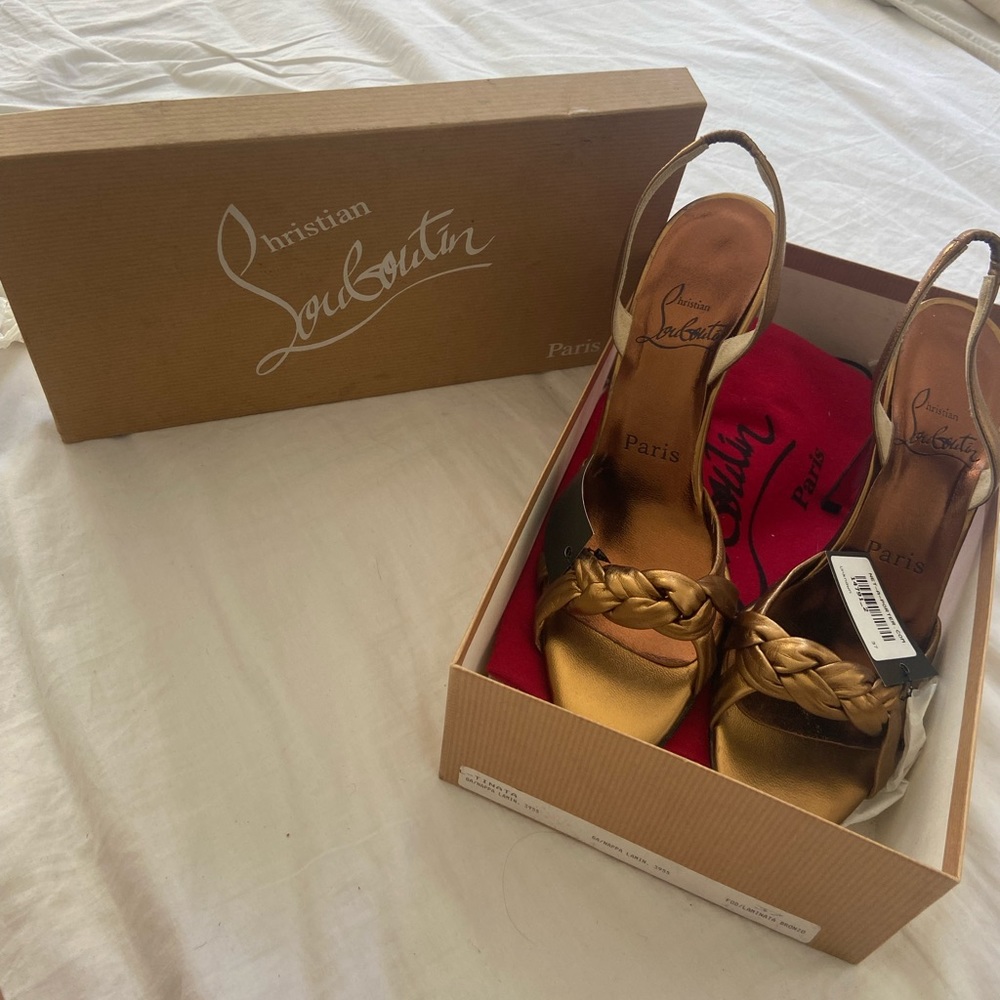 Unworn Christian Louboutin sandal heels
